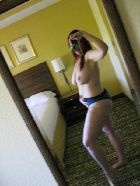 Thick female Ryan Edel takes X rated selfies in the bedroom mirror