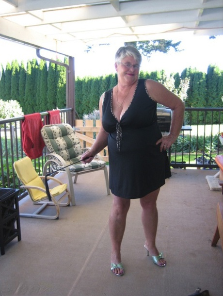 Old lady Girdle Goddess shakes her big butt while on a veranda