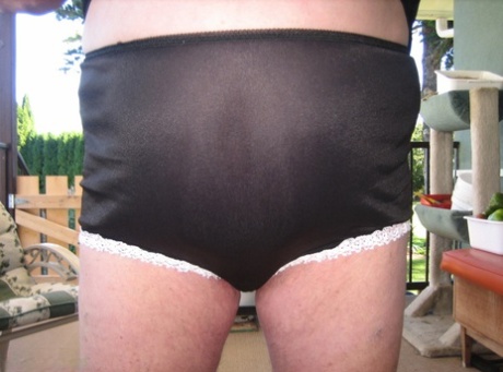 Old lady Girdle Goddess shakes her big butt while on a veranda