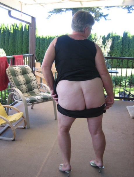 Old lady Girdle Goddess shakes her big butt while on a veranda