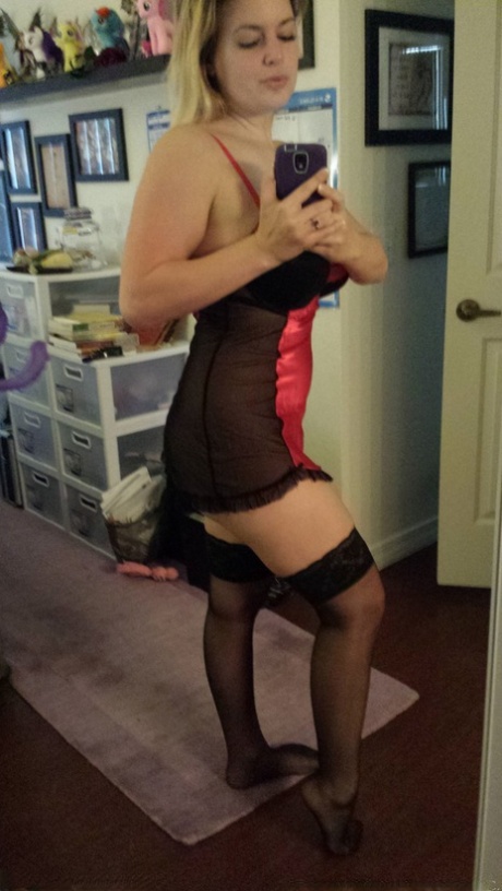 Big boobed amateur Danielle takes naked selfies around the house