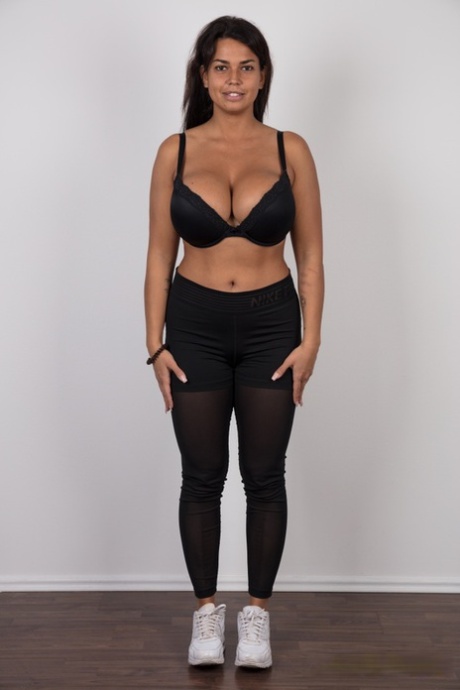 Curvy first timer showcases her bald pussy after removing all her clothes
