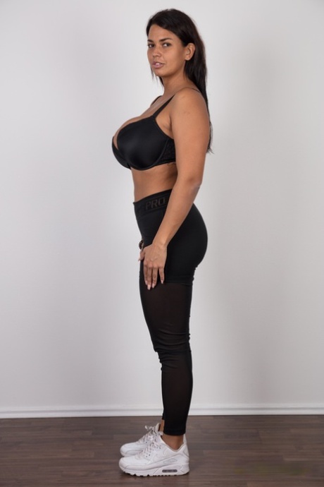 Curvy first timer showcases her bald pussy after removing all her clothes