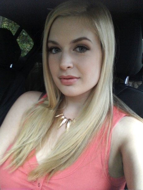 Big boobed amateur is joined by a girlfriend during one of her self shots