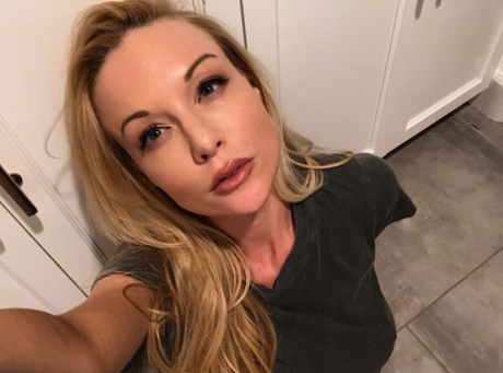 Hot blond Kayden Kross sports long nipples while taking masturbation selfies