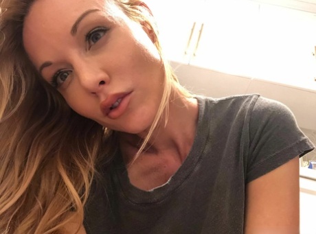 Hot blond Kayden Kross sports long nipples while taking masturbation selfies