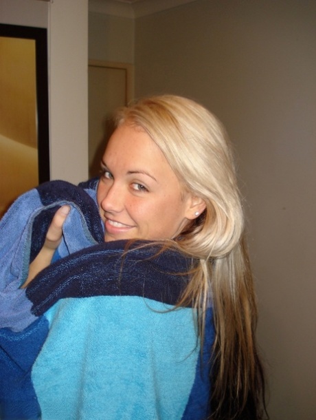 Blonde teen Aussie Jewel releases her great body from a bath towel