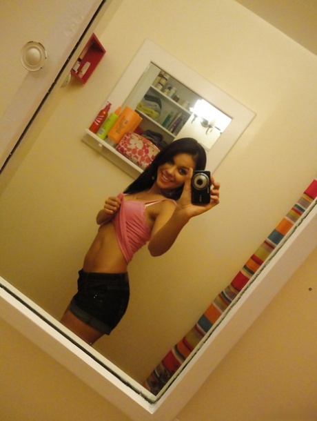 Hot chick Ruby Knox taking selfies in mirror while removing her clothes