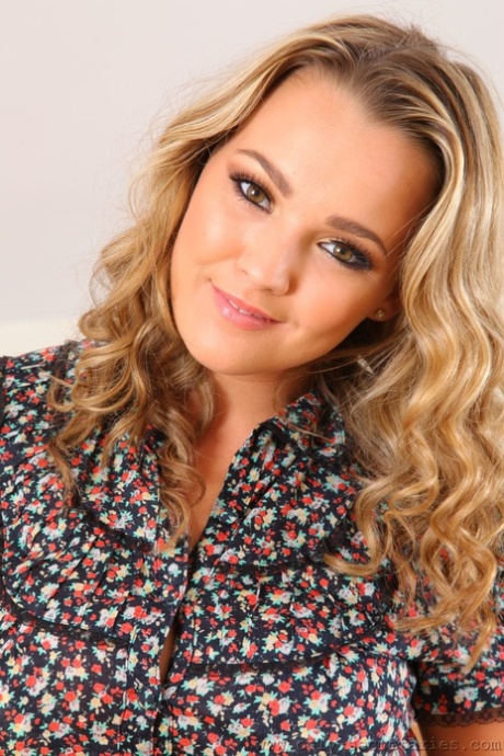 Sexy British teen Jodie Gasson unveils her huge melons in sexy pantyhose