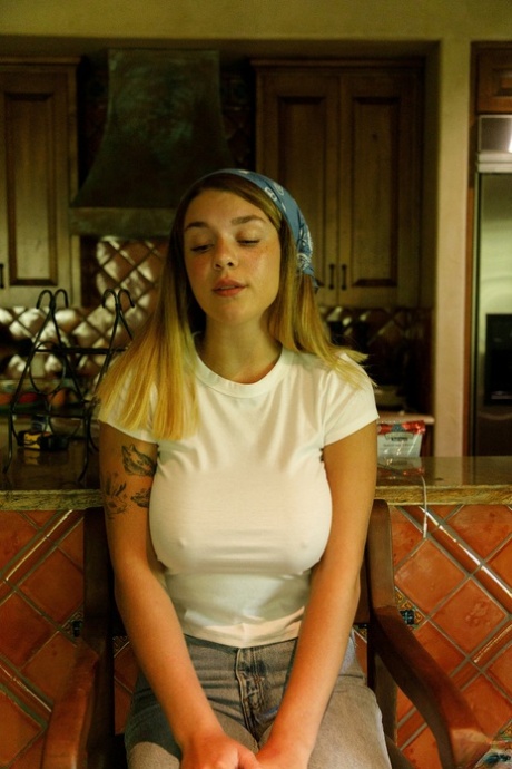 Pretty amateur babe Gabbie Carter flashes her big tits in public