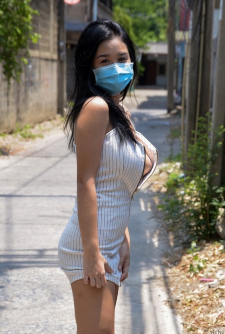 Sexy Thai teen Kahlisa Boonyasak flashes her panties in public & poses naked