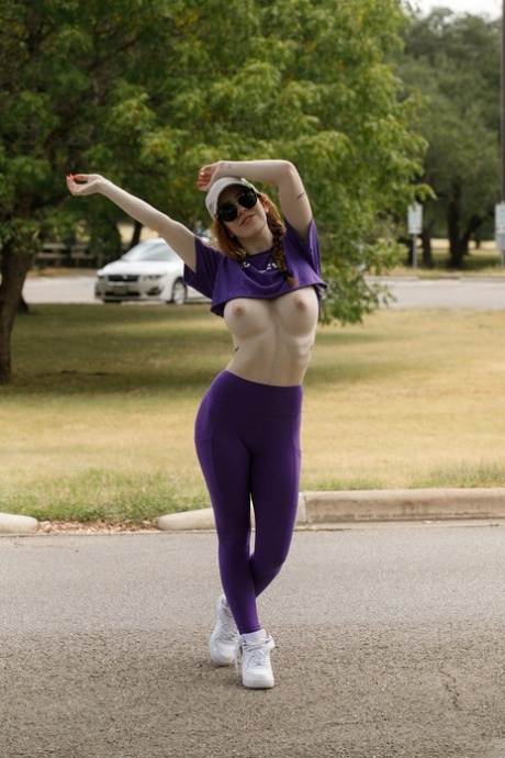 Redheaded babe Nala Brooks flashing her phenomenal big tits in public