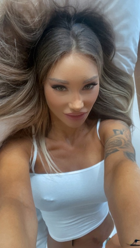 Marvelous Russian pornstar Monika Fox shows her big tits and puffy pussy