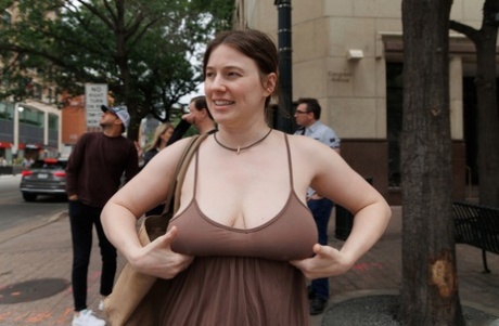 Sexy amateur babe Riley Nixon flashes her big tits & ass in public