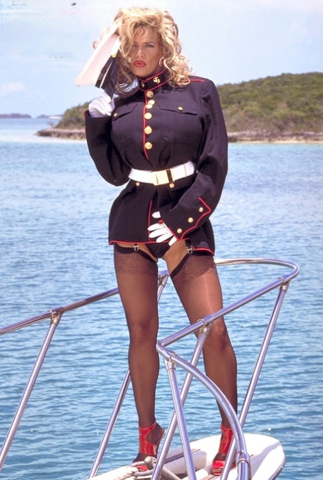 Pornstar Dusty loses her hot navy uniform on a boat & unleashes her giant tits