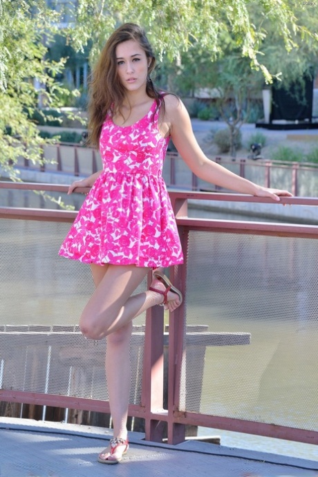 Pantyless American hottie in a dress Bailey flashes her holes in public