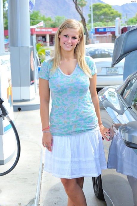 Hot blonde Alice uncovers her grand tits at a petrol station & on public steps