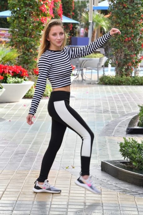 Stunning teen Macy flashes her natural tits while posing in public
